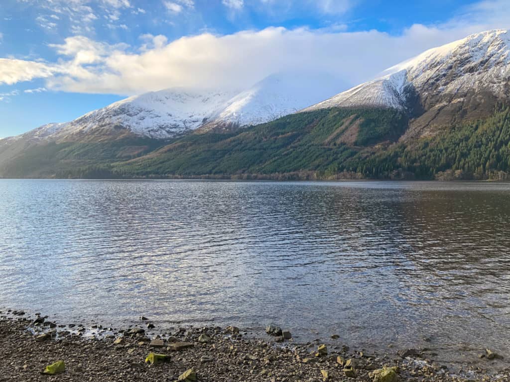 Looking for the perfect day trip from Edinburgh? If you want to see filming locations from Outlander and Harry Potter, witness the beauty of the mountains of Glencoe, and hunt for the Loch Ness Monster, read on about my experience touring the Scottish Highlands with Rabbie's Tours!