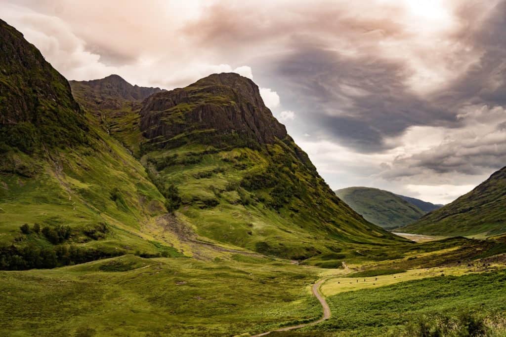 Looking for the perfect day trip from Edinburgh? If you want to see filming locations from Outlander and Harry Potter, witness the beauty of the mountains of Glencoe, and hunt for the Loch Ness Monster, read on about my experience touring the Scottish Highlands with Rabbie's Tours!